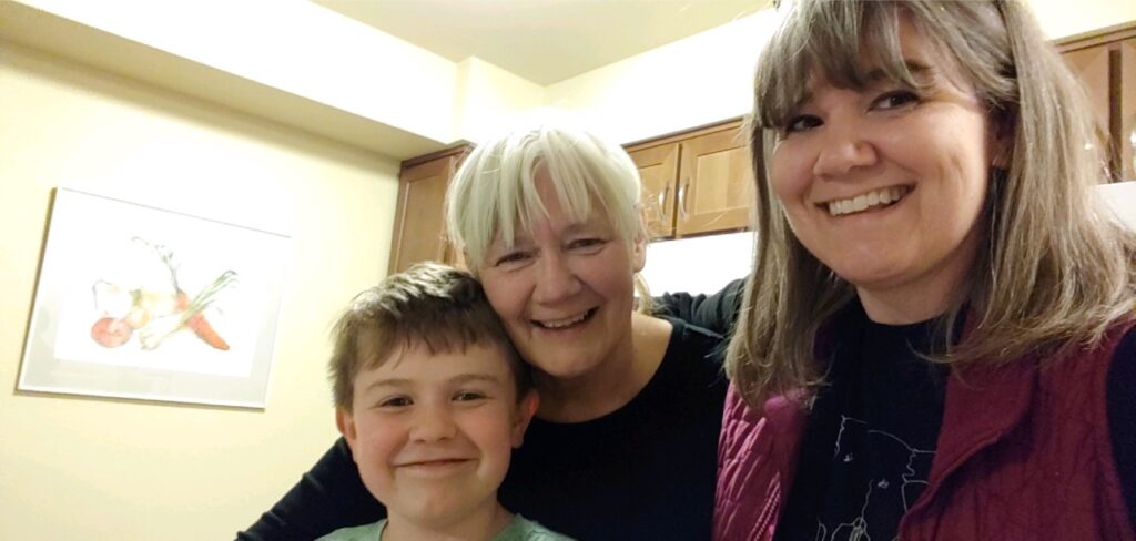 Marilyn with her daughter, Kara, and grandson, Revin.