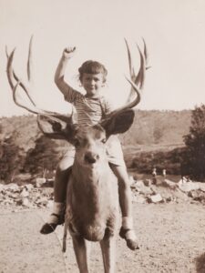 Young Marilyn riding a deer. 